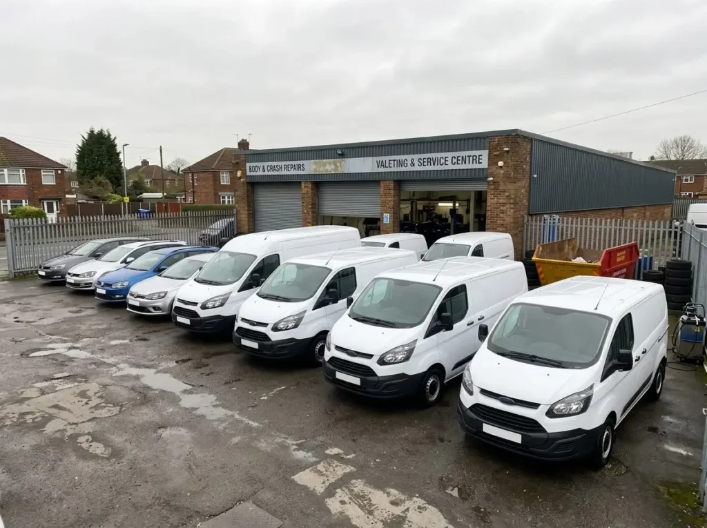 Freshly valeted vans and cars lined up outside a dealership, top-rated car wash in Witham for fleets